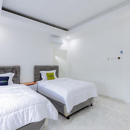 Urbanview Hotel Amira Syariah Bogor Pamoyanan Exterior foto